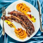 Short Ribs on a plate with delicata squash